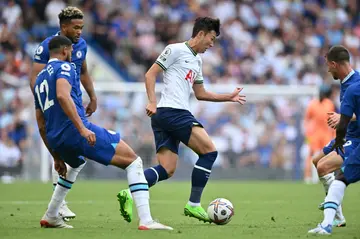 Tottenham forward Son Heung-min (C) in action at Chelsea