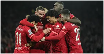 Jordan Henderson celebrates with his teammates after scoring his team's first goal during the UEFA Champions League Semi-Final Leg One match between Liverpool and Villarreal. Photo by David Ramos.
