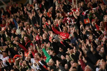 Welsh roar: Wrexham fans celebrate their first goal on Saturday