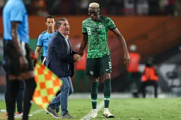 Peseiro with star striker Victor Osimhen during Nigeria's quarter-final win over Angola