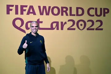 Portugal defender Pepe gives a thumbs up as he arrives for a press conference ahead of the clash with South Korea