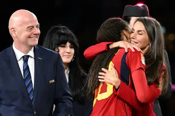 Gianni Infantino watches as Spain's Queen Letizia embraces Spain's Salma Paralluelo after the World Cup final