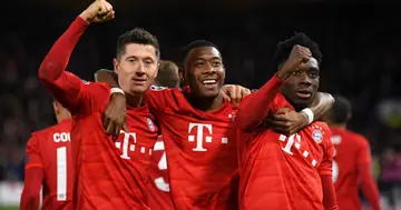 Robert Lewandowski celebrates with David Alaba and Alphonso Davies after he scoring on February 25, 2020 in London, United Kingdom. (Photo by Mike Hewitt/Getty Images)
