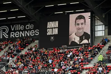 Slain AFP video reporter Arman Soldin's image is displayed at Rennes' stadium -- the journalist once played for the club's youth team