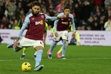 Douglas Luiz's penalty sent Aston Villa joint top of the Premier League