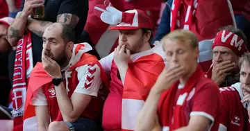 Fans pray for Eriksen during Denmark vs Finland