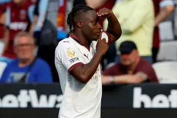 Manchester City's Jeremy Doku celebrates after scoring against West Ham