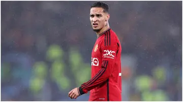 Antony looks dejected following Man United's defeat during the UEFA Champions League match between Manchester United and Galatasaray A.S at Old Trafford. Photo by Alex Livesey.