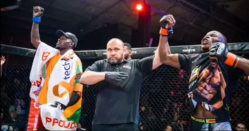 Simbarashe Hokony has his hand raised after winning the Featherweight Grand Prix.