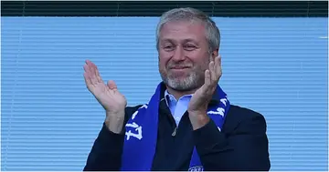 Chelsea's Russian owner Roman Abramovich applauds, as players celebrate their league title win at the end of the Premier League football match between Chelsea and Sunderland at Stamford Bridge in London on May 21, 2017. Photo by Ben STANSALL.