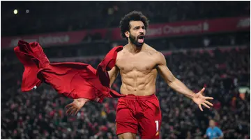 Mohamed Salah celebrates his goal to make it 2-0 during the Premier League match between Liverpool FC and Manchester United at Anfield in 2020. Photo by Michael Regan.