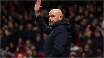 Erik ten Hag waves to fans during the Carabao Cup fourth round match at Old Trafford. Photo by Martin Rickett.