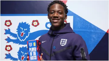 Kobbie Mainoo poses for a photo with the Player of the Match award following the international friendly match between England and Belgium. Photo by Eddie Keogh.