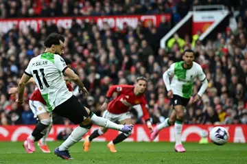 Mohamed Salah equalises for Liverpool by converting a penalty against Manchester United