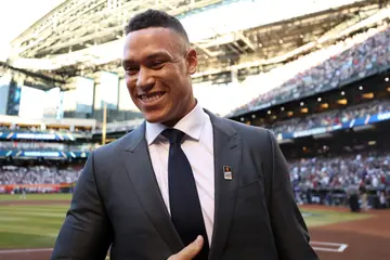 Aaron Judge celebrates after being announced as the winner of the 2023 Roberto Clemente Award