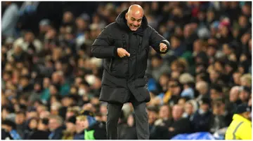 Pep Guardiola reacts during the Premier League match at the Etihad Stadium. Photo by Martin Rickett.