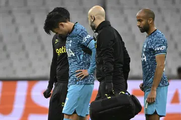 Son Heung-Min leaves the pitch after fracturing his eye socket against Marseille in the Champions League