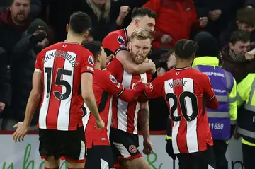Oli McBurnie (centre) scored a 102st-minute penalty to salvage a 2-2 draw for Sheffield United