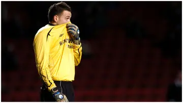 Former Chelsea goalkeeper Lenny Pidgeley cuts a dejected face while in action for the Blues. Photo by Jon Buckle.