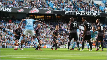 Manuel Akanji appears to stand in an offside position as Nathan Ake of Manchester City scores their side's second goal during the Premier League match between Manchester City and Fulham at Etihad Stadium. Photo by James Gill.