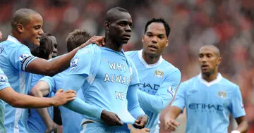 Mario Balotelli celebrating his goal for Manchester City against Manchester United. Credit: Getty Images