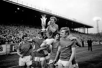 Leeds United captain Billy Bremner holds the Fairs Cup aloft, on June 02 1971, as he celebrates victory with his teammates: (l-r) Johnny Giles, Allan Clarke, Bremner, Mick Bates, Mick Jones