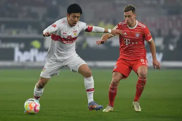 Wataru Endo (L) is set to add to Liverpool's options in midfield