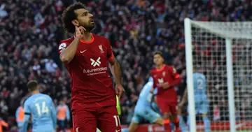 Mohamed Salah of Liverpool celebrates after scoring the second goal during the Premier League match between Liverpool and Manchester City at Anfield on October 03, 2021 in Liverpool, England. (Photo by John Powell/Liverpool FC via Getty Images)
