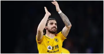 Ruben Neves of Wolverhampton Wanderers applauds the fans after scoring his side's fourth goal against Watford at Molineux. Photo by Naomi Baker.