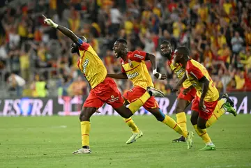 Seko Fofana (L) celebrates after scoring for Lens against Rennes last weekend