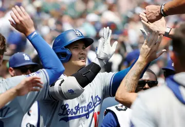 Los Angeles Dodgers' star Shohei Ohtani celebrates his 200th Major League Baseball home run, in game against the Detroit Tigers