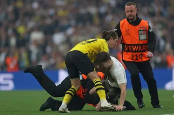 The start to the Champions League final was disrupted by three pitch invaders