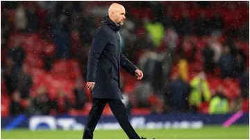 Erik ten Hag walks off the pitch following the Premier League match between Manchester United and Manchester City at Old Trafford. Photo by Catherine Ivill.