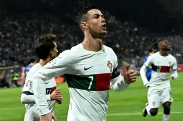 Portugal forward Cristiano Ronaldo celebrates during the rout of Bosnia on Monday in Euro 2024 qualifying as he extended his own goalscoring record