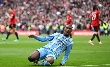 Haji Wright of Coventry City celebrates scoring his team's third goal from the penalty spot against Manchester United at Wembley Stadium.