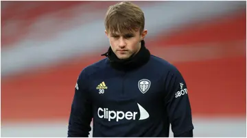 Joe Gelhardt warms up prior to the Premier League match between Arsenal and Leeds United at Emirates Stadium. Photo: Adam Davy.