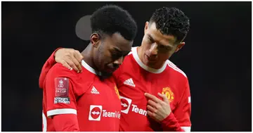 Cristiano Ronaldo consoles Anthony Elanga after the Emirates FA Cup Fourth Round match between Manchester United and Middlesbrough at Old Trafford. Photo by James Gill - Danehouse.