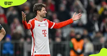 Bayern Munchen's Thomas Müller acknowledges fans.