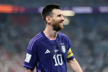 Lionel Messi and Argentina recovered from a shock opening defeat by Saudi Arabia to win their group