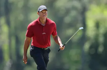 Tiger Woods walks to the 18th green during the final round of the 2024 Masters Tournament
