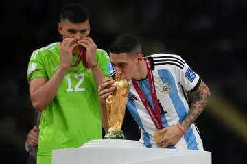 Argentina goalkeeper Geronimo Rulli (left) celebrates after the team's World Cup final win over France in December