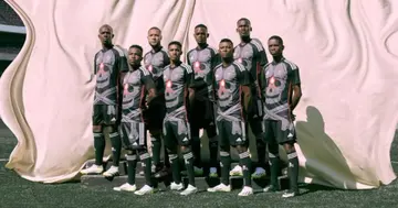 Orlando Pirates' players pose in their new kit for the 2023/24 season. 