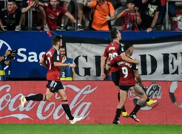 Winning moment: Osasuna's Spanish midfielder Aimar Oroz (2nd right) celebrates