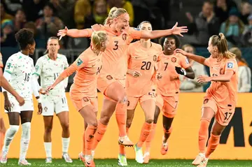 Netherlands defender  Stefanie van der Gragt  celebrates her goal
