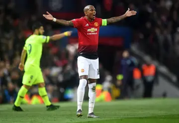Man United fans demand Ashley Young be sold at once after Barcelona game exposes skipper