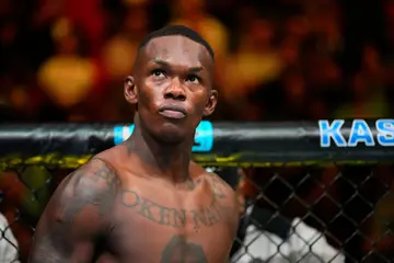 Israel Adesanya, God, existence