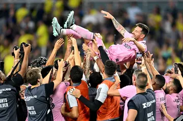 Teammates hold up Inter Miami's Argentine forward Lionel Messi as they celebrate after winning the Leagues Cup final football match against Nashville SC at Geodis Park on August 19, 2023.