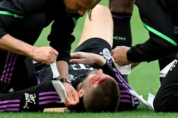 Bayern Munich's Eric Dier had to be treated after a blow to the head during Saturday's defeat to Stuttgart