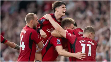 Scott McTominay of Manchester United celebrates scoring the winning goal with teammates during their Premier League match against Brentford FC at Old Trafford. Photo by Joe Prior.