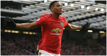 Anthony Martial celebrates scoring their first goal during the Premier League match between Manchester United and Manchester City at Old Trafford. Photo by Tom Purslow.
